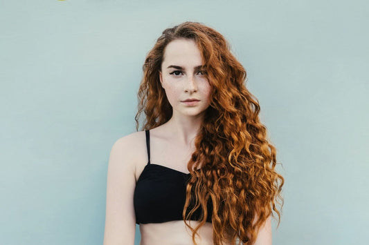 Woman with red curly hair